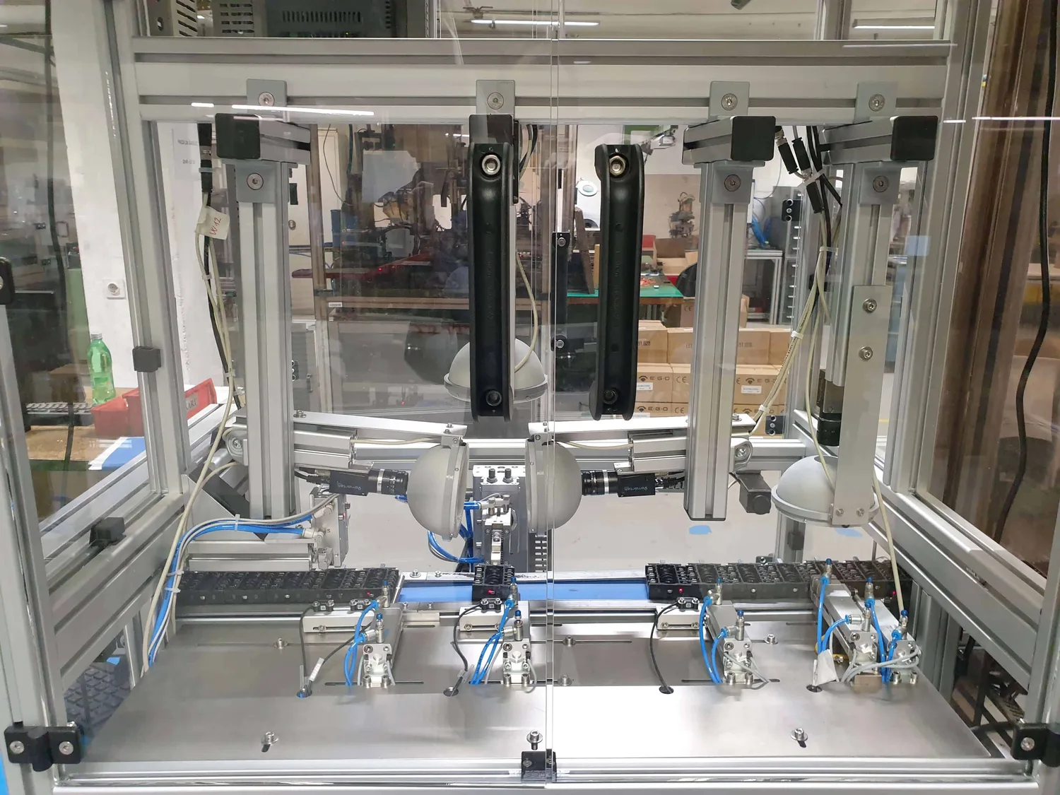 Two Basler cameras with ring lights at the optical inspection station of the AOI Sklopka machine
