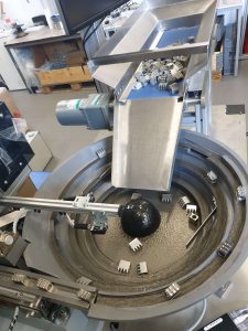 Hopper and bowl feeder with sensor.