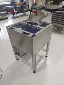 Bowl feeder system in housing