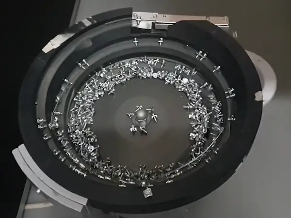 ENSO screw feeder for E.G.O. Elektrokontakt (Zagreb): Adding screws with washers performed at the AFAG plant.